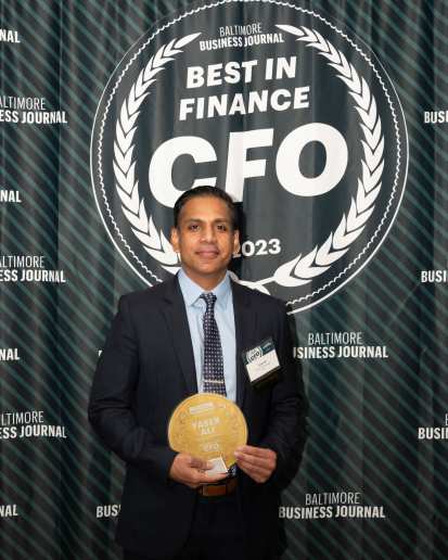 Yaser Ali receiving the BBJ CFO Award